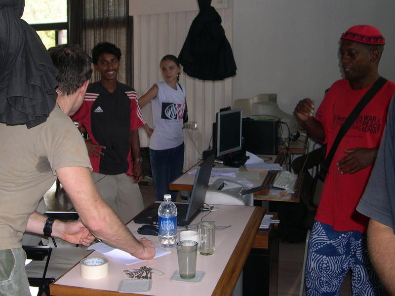 Photographer:Auroville Radio Team  | Anthony Sloan (in red) at the AurovilleRadio organizing the show