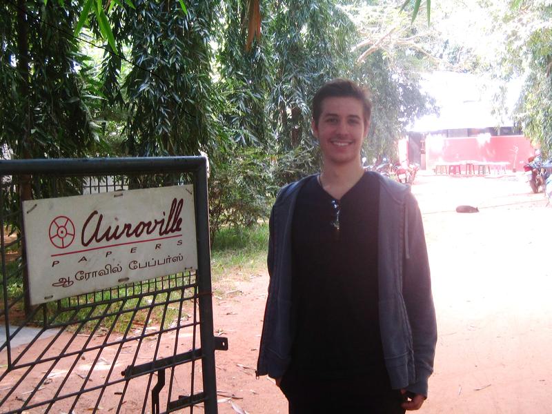 Photographer:Giorgio & Emma | Joshua at the Gate of Auroville Papers