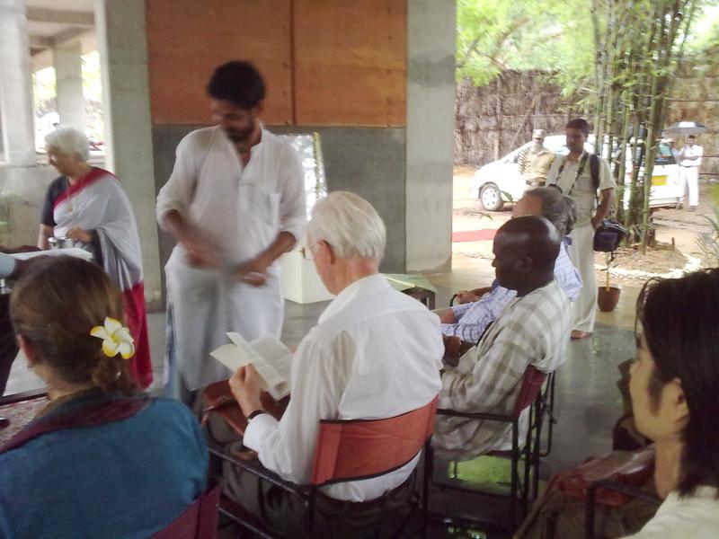 Photographer:Andrea | Members of the Auroville's Governing Board are receiving the book by Drhuv.