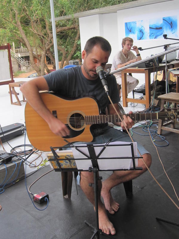 Photographer:Puja | Suryan playing his guitar. The inauguration started at 6 and ended at 6 pm.