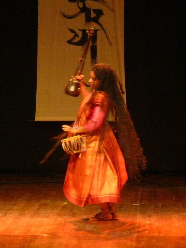 Photographer:Maria | Dancing Parvathy plays with drum, anklets with bells and Ektara, one-stringed 