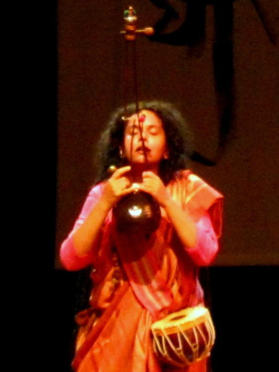 Photographer:Maria | An intense moment of Parvathy's performance with Ektara and Duggi, a small hand-held earthen drum