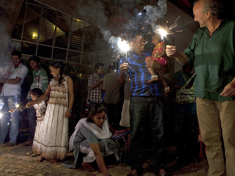 Photographer:Andrea Kunkl | Kids and adults celebrating Diwali.