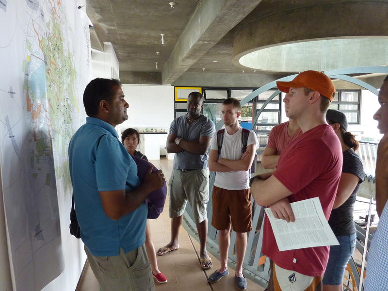Photographer:Michael Rac | Lalit (left) with students from Queen's University in Kingston, Ontario.