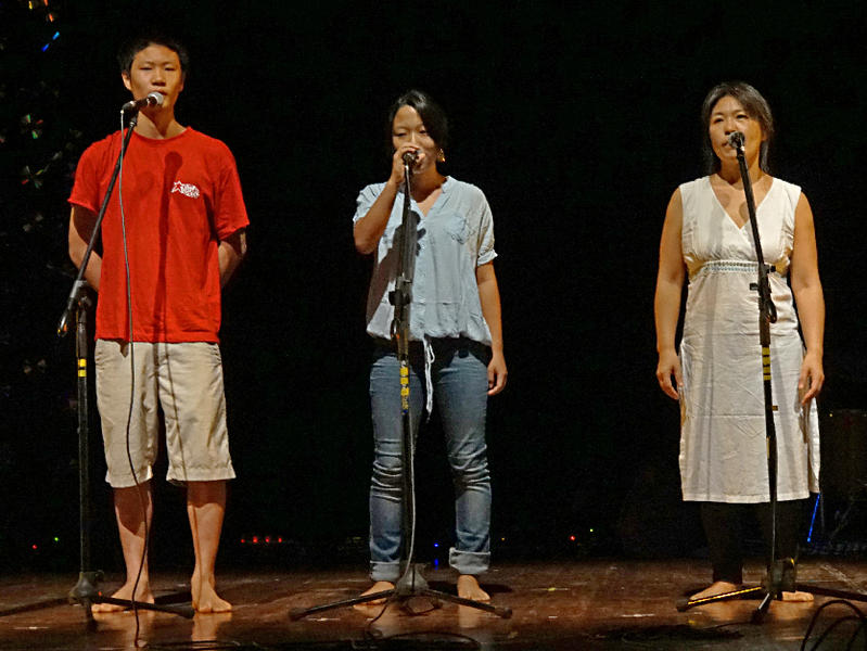 Photographer:Giorgio Molinari | From Right: Amu, Heyong and their mum singing a Korean song.