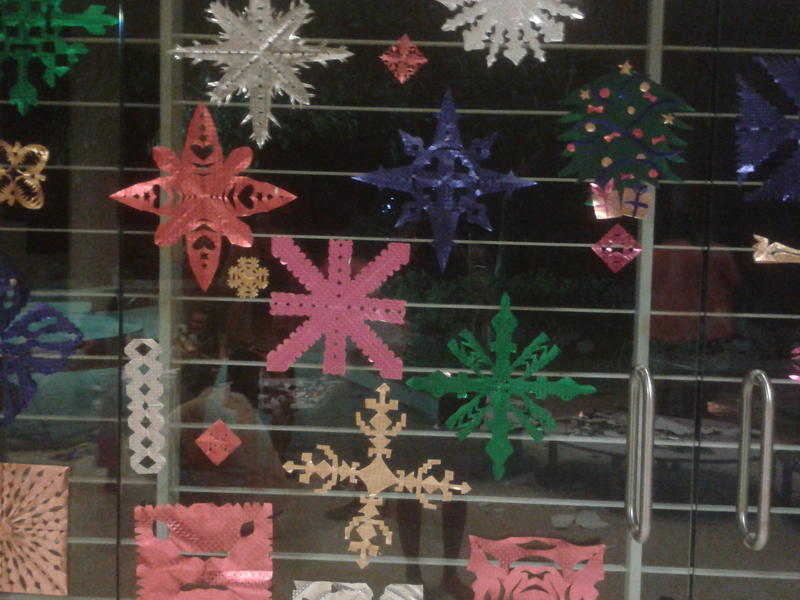 Photographer:Devaja | Pretty Snowflakes Adorning the Glass Panel