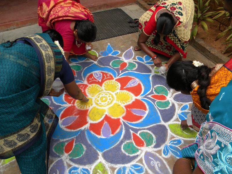 Photographer:Auroville Village Action | Creating a welcome Kolam