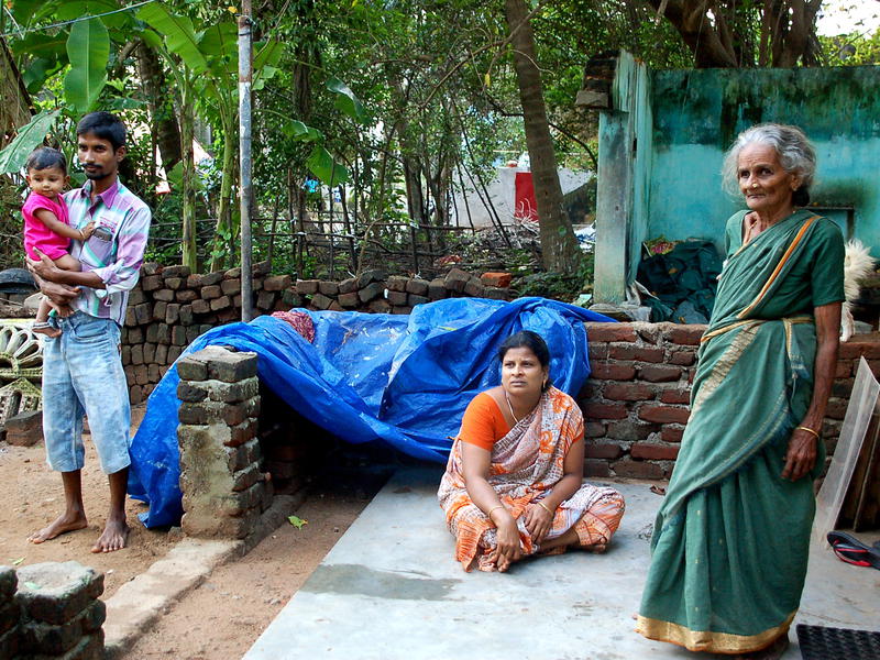 Photographer:Frida | Venkatesh (with his family) is one of the Auroville workers affected by the flood