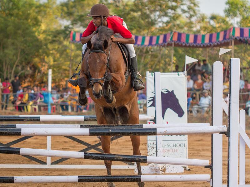 Photographer:Pondicherry Arun | Vikas makes a stunning jump with his horse