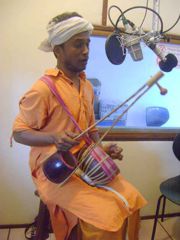 Photographer:Lana | Sudipto Shekhar Mridha with instruments - ektara and duggi