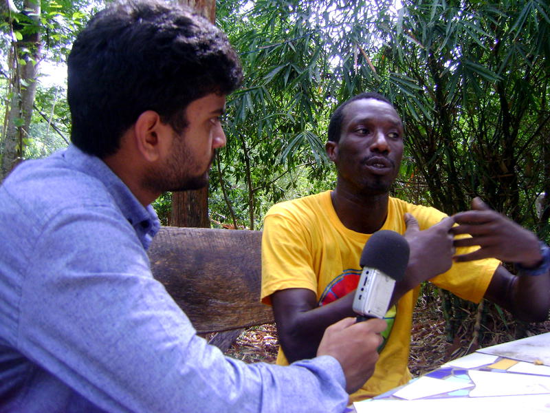 Photographer:David Dinakaran E | Samy, a volunteer at the Youth Centre and initiator of Bantu Ubuntu being interviewed by Stephen