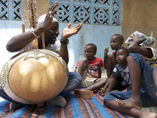 Photographer:web | Mandinka Culture - griot conveying the story