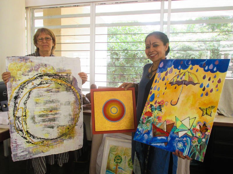 Photographer:Sitharth | Jaya and Devasmita holiding few donated art pieces