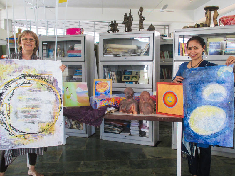 Photographer:Sitharth | Jaya and Devasmita holiding few donated art pieces