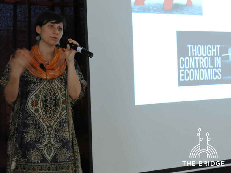 Photographer:Cassandra | Visiting researcher Lara Monticelli presenting on current trends in social change movements (Unity Pavillion)