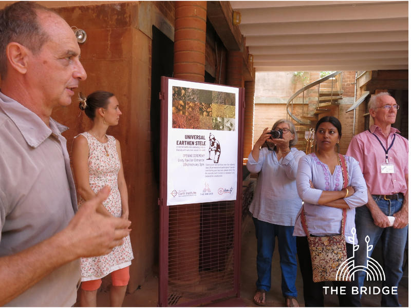 Photographer:Cassandra | Satprem Maini showing us around the Auroville Earth Institute