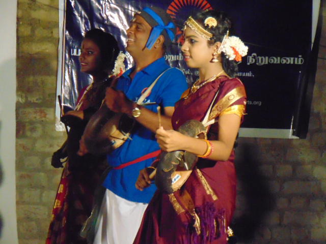 Photographer:Gino | Priya, Srinivasan, and a student perfoming a traditional dance which includes drumming
