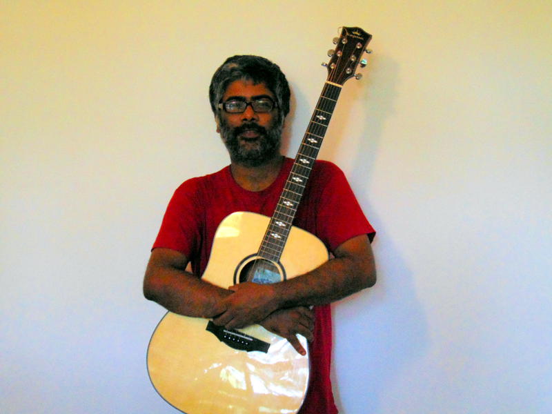 Photographer:Zarin | Ananth Menon with his guitar